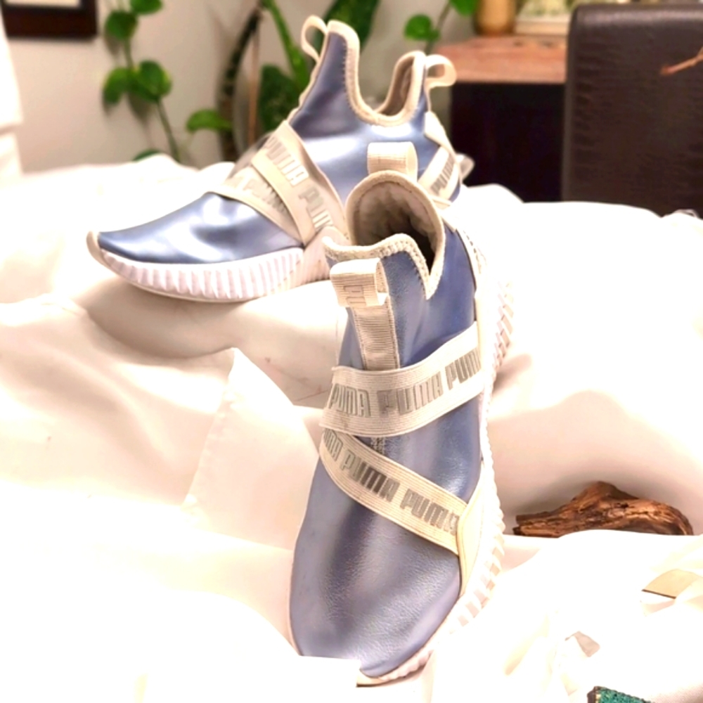 Puma Silver slip on running shoes.